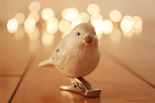 This charming little bird adds a delicate, festive touch wherever it is placed.