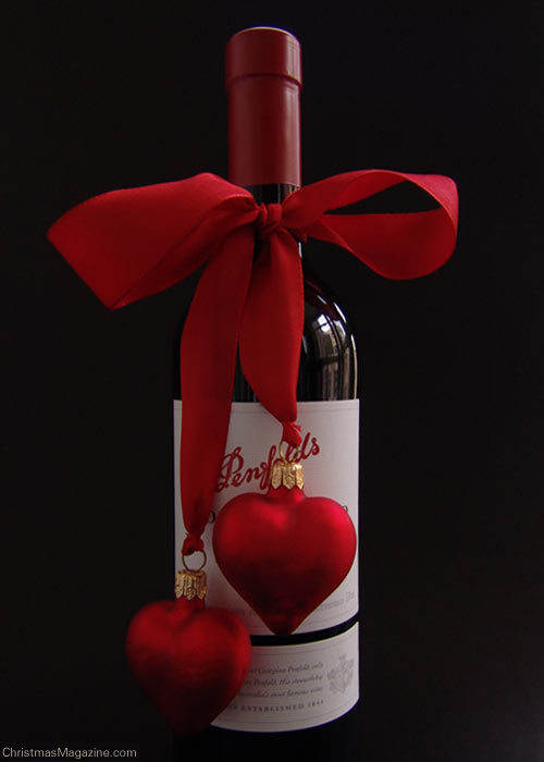 bottle adorned with Christmas ornament