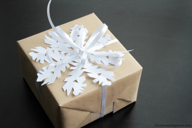 Christmas gift with paper snowflake