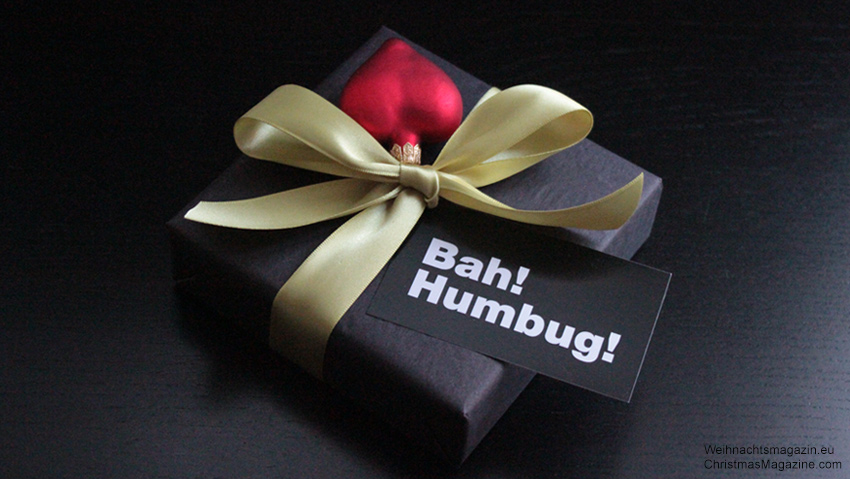 gift wrapped in black with Bah! Humbug! gift tag