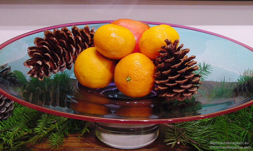 festive fruit bowl, pinecones, mandarins, fir