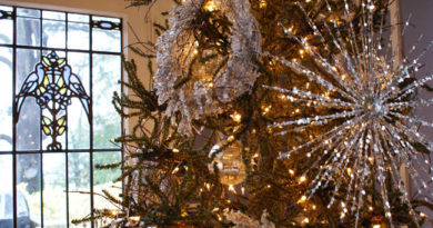 Christmas tree decoarted with silver and white ornaments