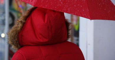 red umbrella and snow