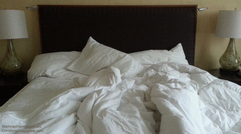 unmade hotel bed