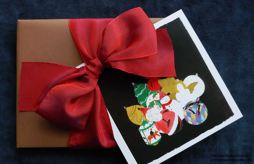 gift wrapped in brown paper, ruby bow, watercolour Christmas card