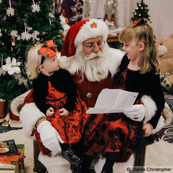 Santa Christopher with children and wishlist