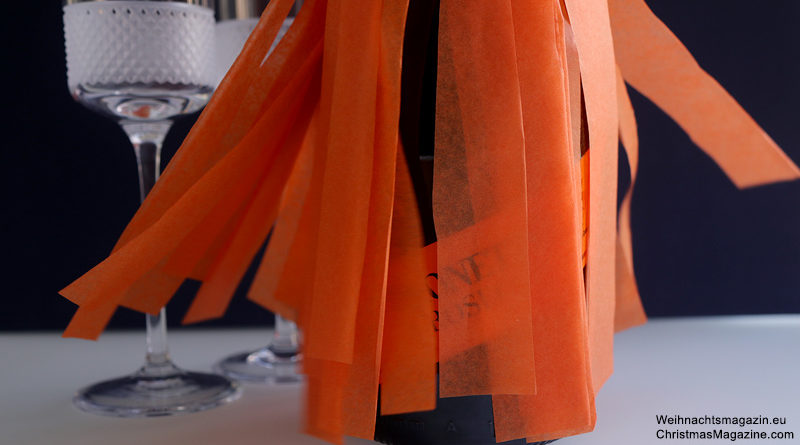 bottle wrapping, tissue paper, orange