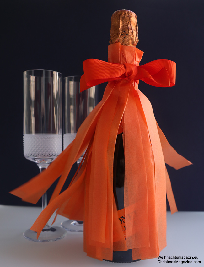 bottle wrapping, tissue paper, orange