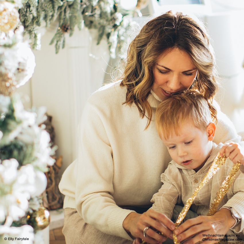 mother with boy and Christmas tree