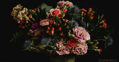 arrangement with a mix of dark flowers