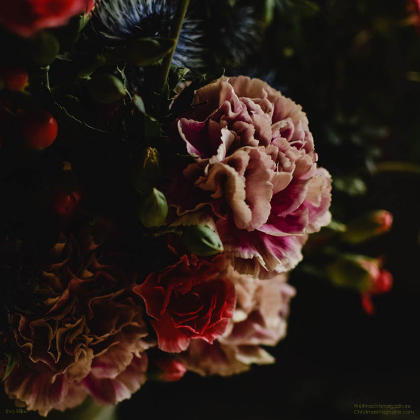 arrangement with a mix of dark flowers, Christmas bouquet