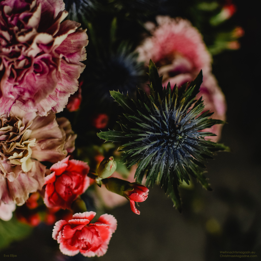 arrangement with a mix of dark flowers, Christmas bouquet, carnations