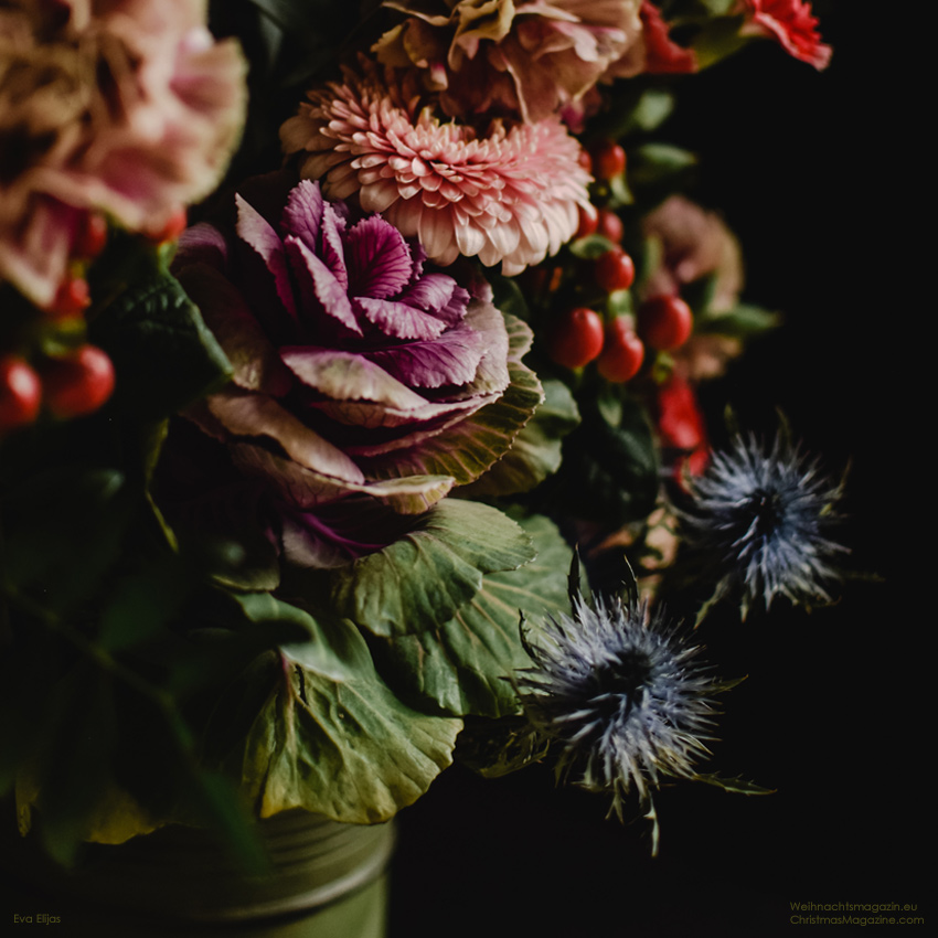 arrangement with a mix of dark flowers, Christmas bouquet, blue thistle
